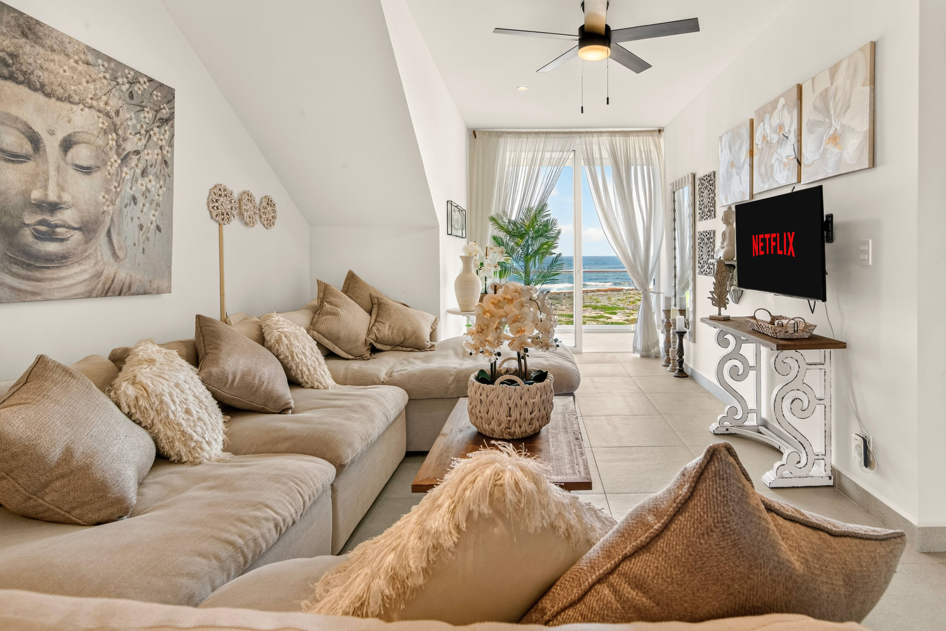 Bright ocean-view living room in a PPIM Akumal condo rental