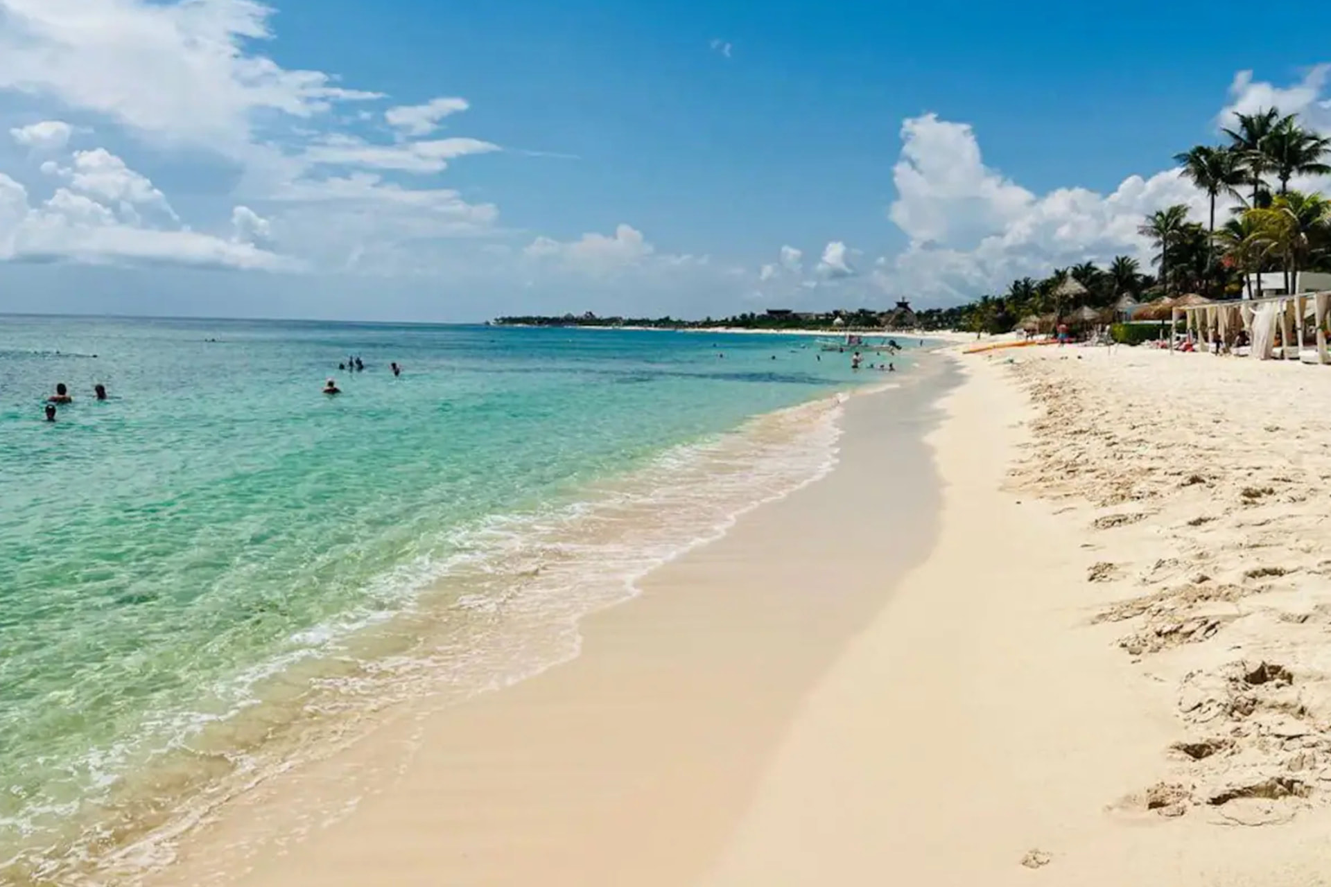 White sand public beach and turquoise water near Santamar by TAO in Akumal