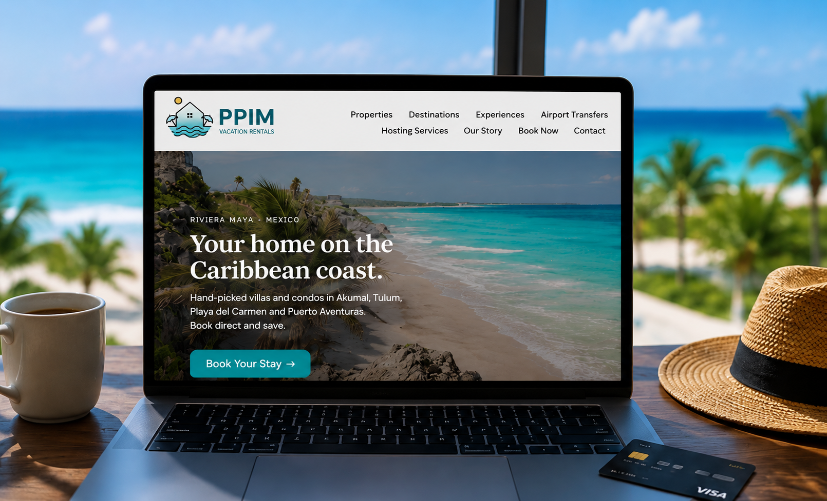 Laptop displaying the PPIM Vacation Rentals website with secure direct booking, placed next to a credit card on a Caribbean beachside desk