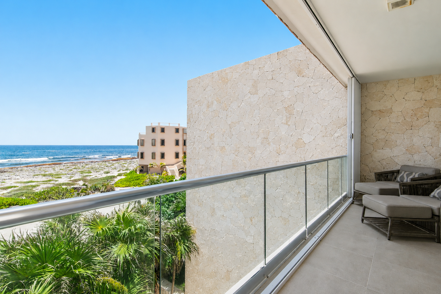 Private balcony with ocean view at a PPIM Akumal condo rental