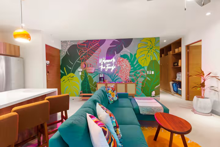 Bright, professionally styled living room of a PPIM Vacation Rental villa in the Riviera Maya